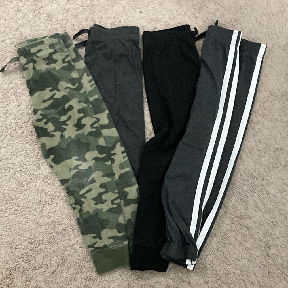 4 pairs light weight knit 5t pants. Garanimals.